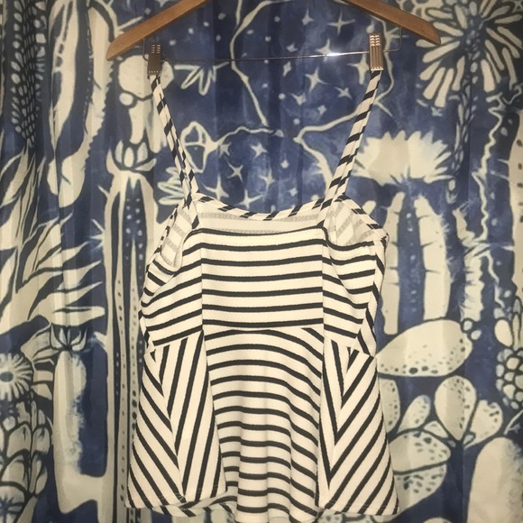 Sleeveless Peplum Top - Picture 2 of 7